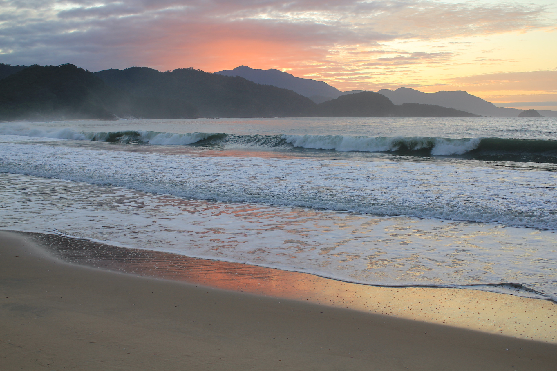 Professional craniosacral therapist performing a head technique on a supine client